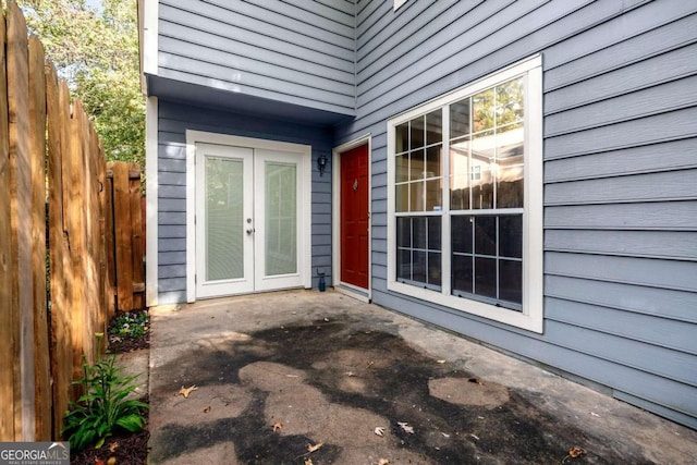 doorway to property with a patio area