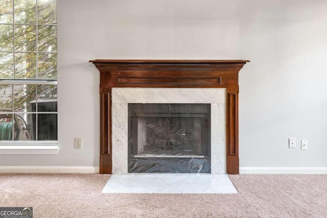 details with carpet, cooling unit, and a fireplace