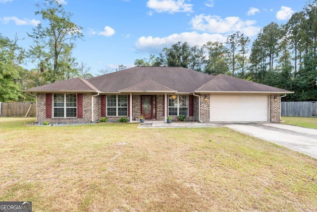 ranch-style home featuring a front lawn and a garage