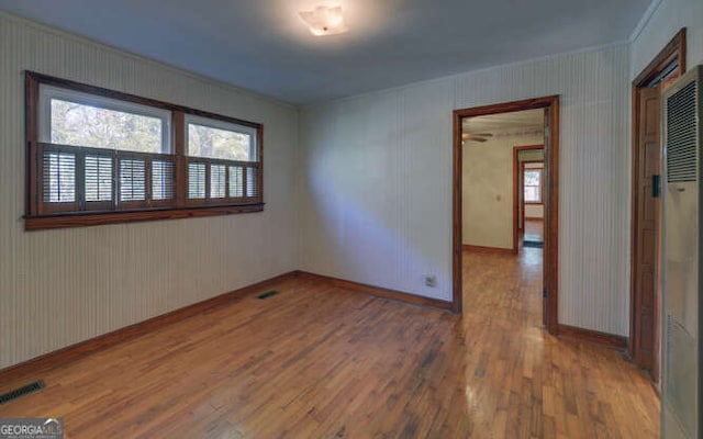 empty room featuring hardwood / wood-style floors