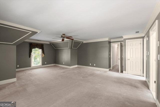 bonus room featuring ceiling fan, lofted ceiling, light carpet, visible vents, and baseboards