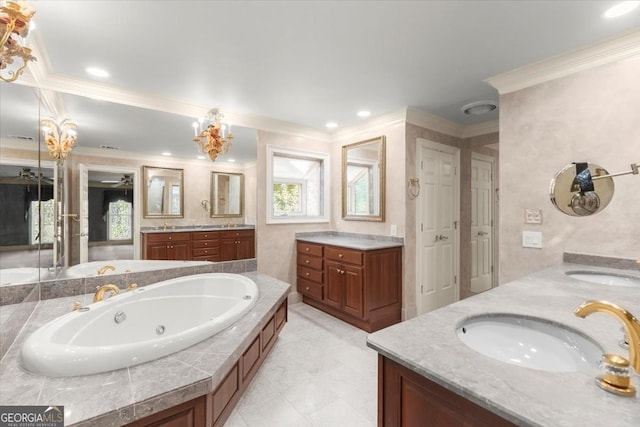 bathroom with crown molding, two vanities, a sink, and a whirlpool tub