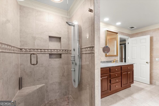 full bath featuring a shower stall, visible vents, crown molding, and vanity