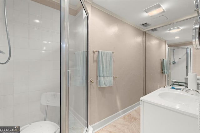 full bathroom featuring visible vents, ornamental molding, a shower stall, vanity, and baseboards