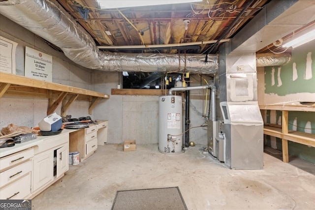 unfinished basement featuring heating unit and water heater