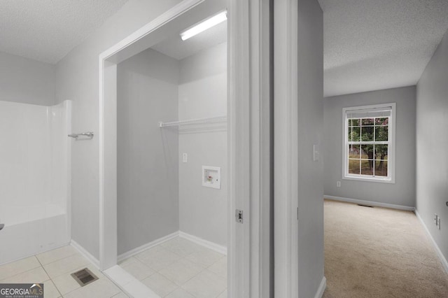 bathroom with a textured ceiling