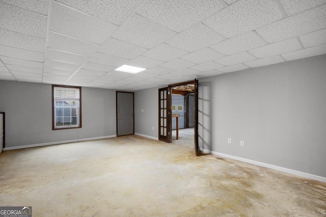 basement with a drop ceiling