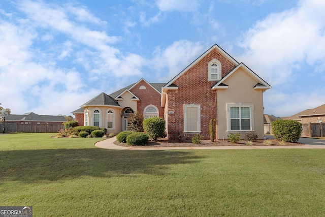 505 Arbor Ln, Centerville, GA 31028 - traditional-style house featuring brick siding and stucco siding