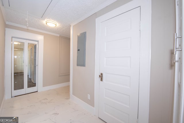 hall with ornamental molding, a textured ceiling, and electric panel