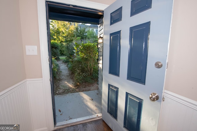 doorway to outside featuring dark hardwood / wood-style floors