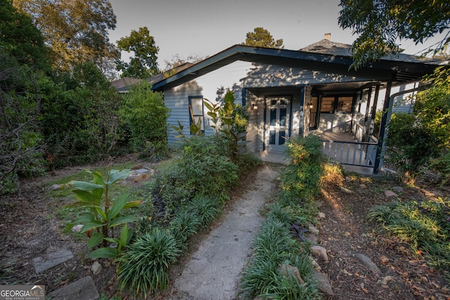 view of front of home featuring covered porch