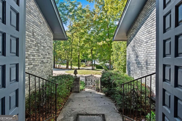 view of home's exterior with brick siding