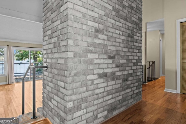 details with baseboards and wood finished floors