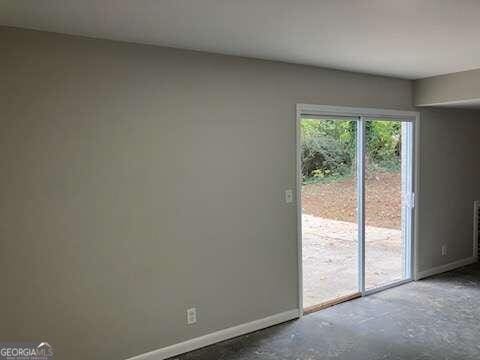 spare room featuring concrete floors