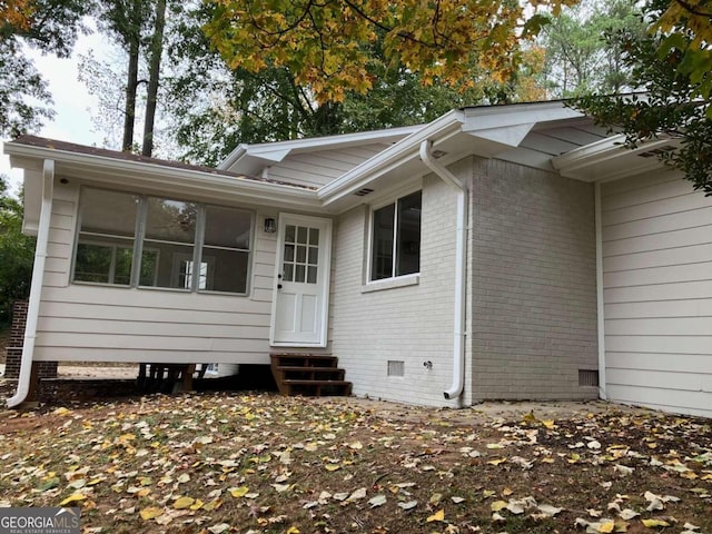 3666 Elkridge Dr, Decatur, GA 30032 - back of property with brick siding and entry steps