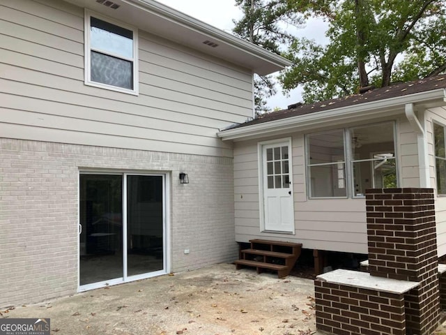 3666 Elkridge Dr, Decatur, GA 30032 - rear view of property with brick siding, a patio, and entry steps