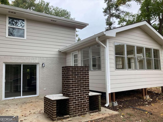 3666 Elkridge Dr, Decatur, GA 30032 - view of home's exterior with central AC unit and brick siding
