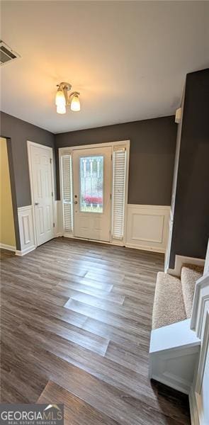 entryway with light hardwood / wood-style flooring