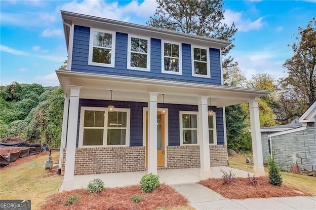 view of front of home featuring covered porch