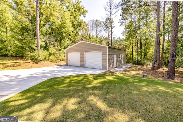 garage featuring a yard