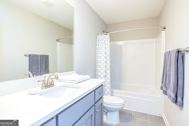 full bathroom with vanity, shower / bathtub combination with curtain, toilet, and tile patterned floors