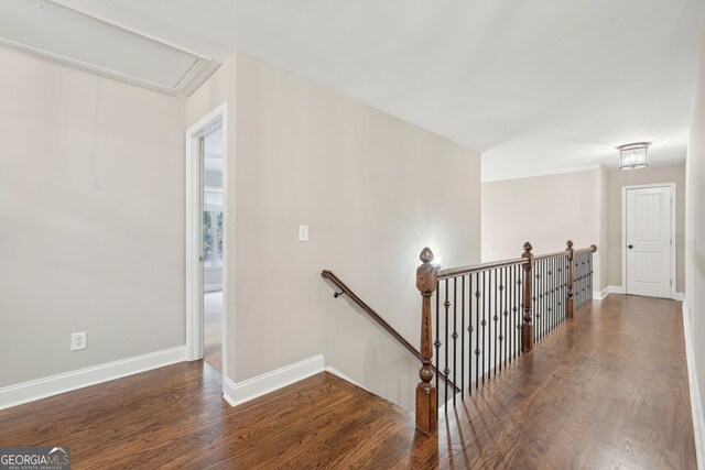 stairs featuring hardwood / wood-style flooring