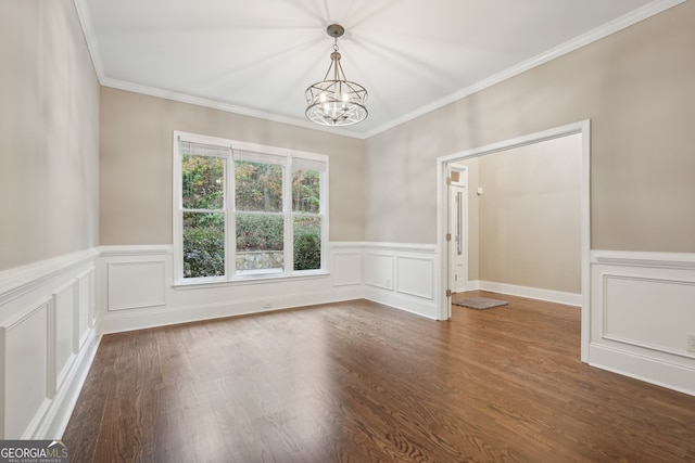 unfurnished room with crown molding, a notable chandelier, and dark hardwood / wood-style flooring