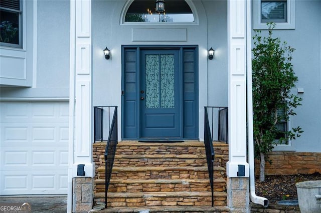 property entrance featuring a garage