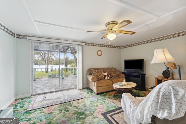 living room featuring ceiling fan