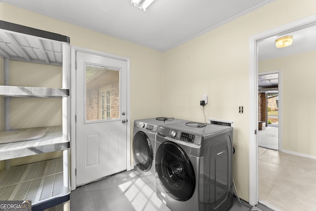 laundry area featuring washer and clothes dryer