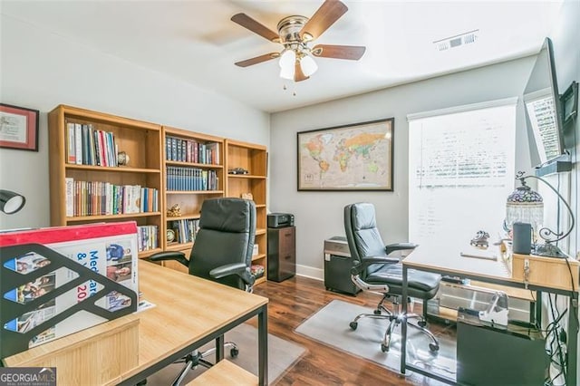 office featuring hardwood / wood-style flooring and ceiling fan