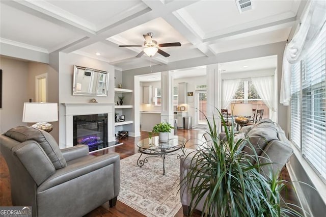 living room featuring coffered ceiling, beamed ceiling, and dark hardwood / wood-style flooring