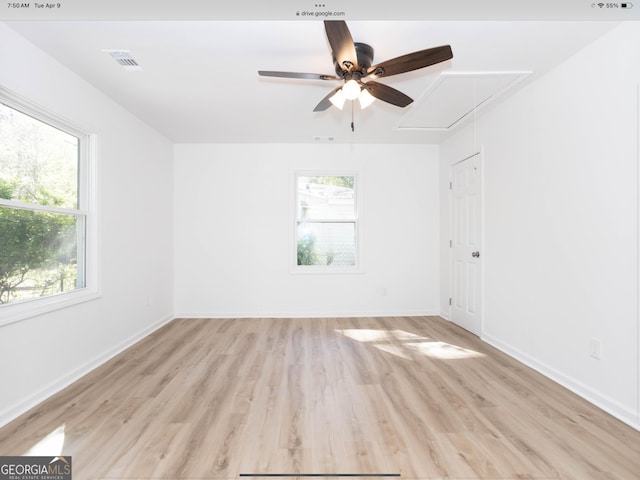 3363 Delmar Ln NW, Atlanta, GA 30331 - spare room featuring attic access, ceiling fan, light wood-type flooring, and baseboards