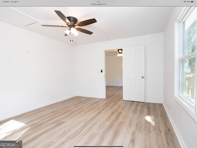 3363 Delmar Ln NW, Atlanta, GA 30331 - spare room featuring attic access, light wood-style floors, a ceiling fan, and baseboards