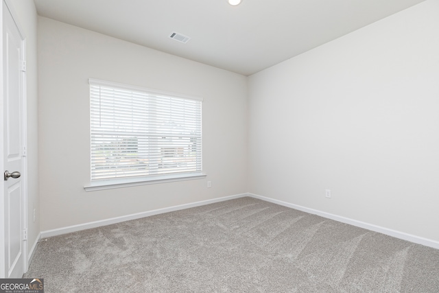 view of carpeted spare room