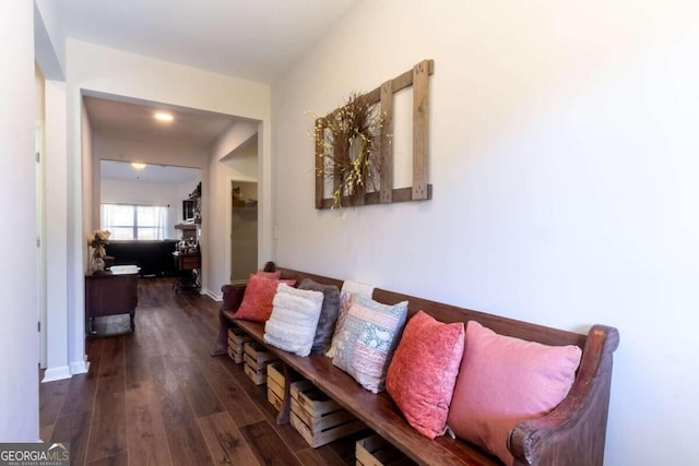 hallway with dark wood-type flooring