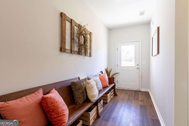 doorway with hardwood / wood-style floors