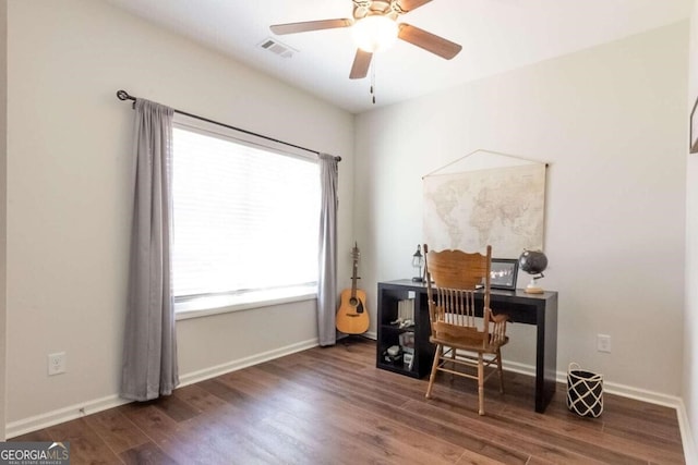 office space with ceiling fan and dark hardwood / wood-style flooring