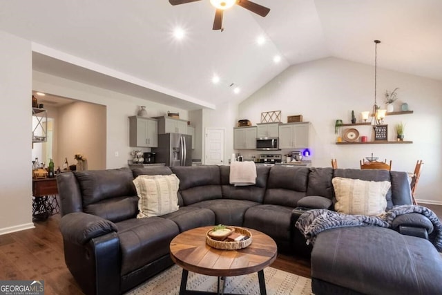 living room featuring hardwood / wood-style flooring, ceiling fan, and lofted ceiling