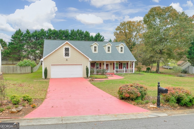 cape cod house with a garage, covered porch, and a front lawn