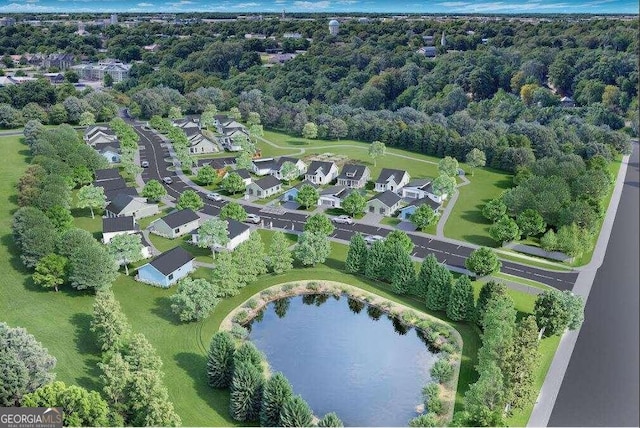 aerial view with a water view and a wooded view