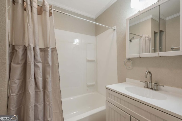 bathroom featuring shower / bath combination with curtain, ornamental molding, and vanity