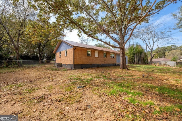 exterior space featuring cooling unit