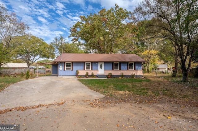 single story home with a carport