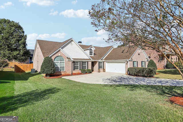 view of front of house with a front lawn and a garage