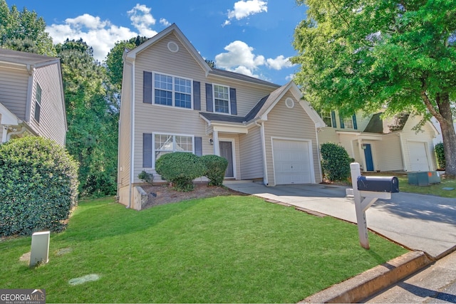 front of property with a front yard and a garage