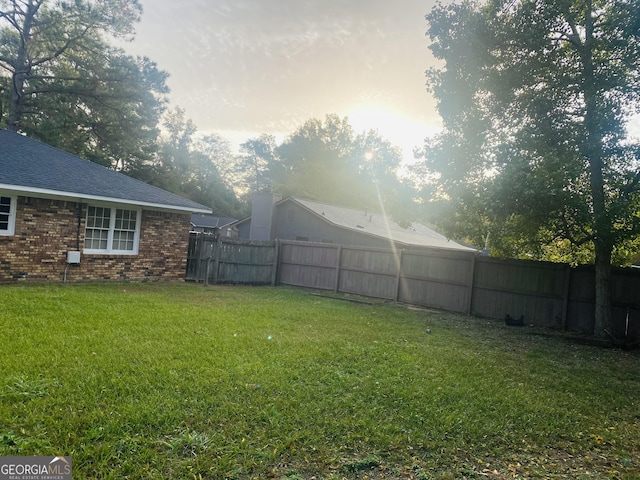 view of yard featuring a fenced backyard