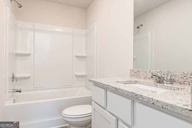 full bathroom with vanity, shower / washtub combination, and toilet