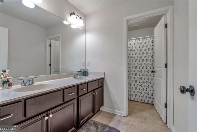 bathroom featuring vanity, tile patterned floors, and a shower with shower curtain