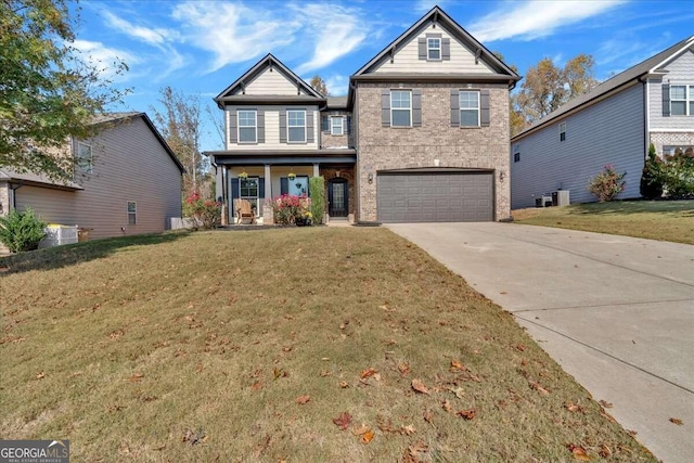 view of front of home featuring a garage and a front lawn